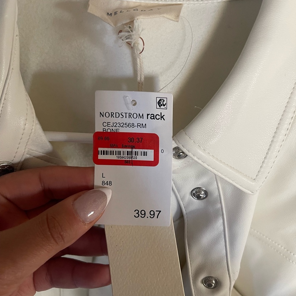 Never been worn, cream faux leather bottom down top